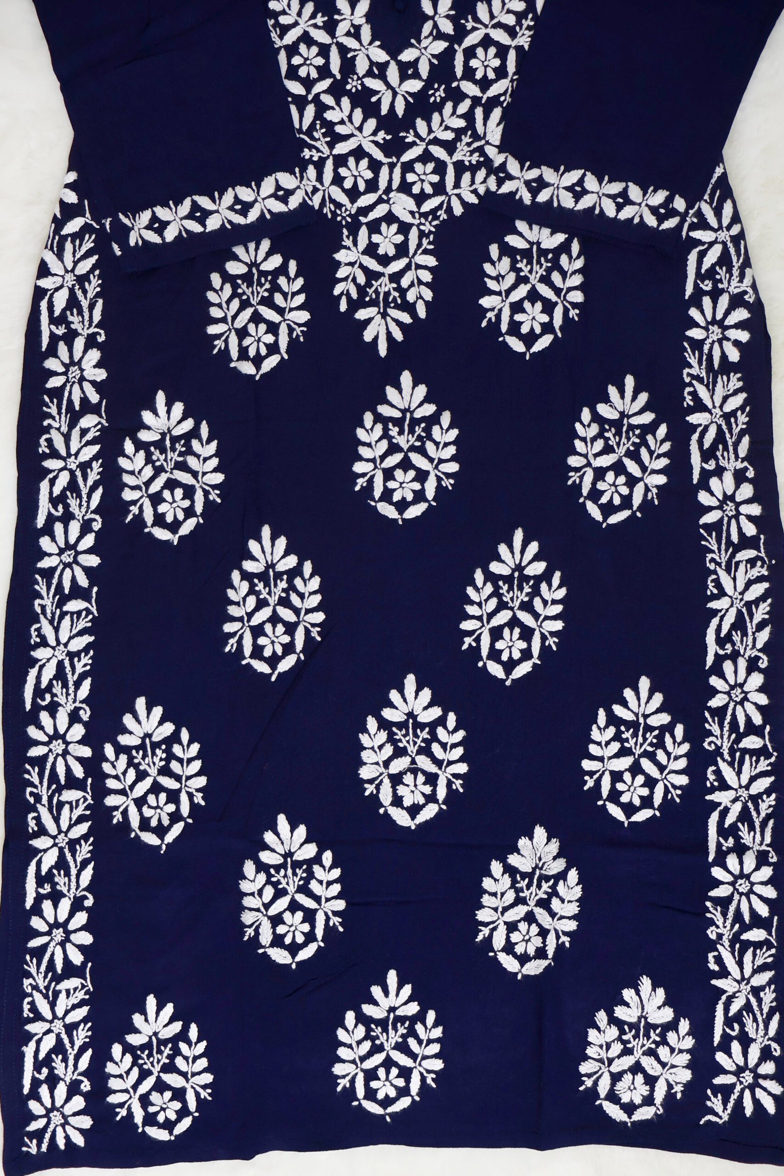 purewear creations navy blue chikankari embroidered kurti with heavy neck panel & side border work purewear creations navy blue chikankari embroidered kurti with heavy neck panel & side border work